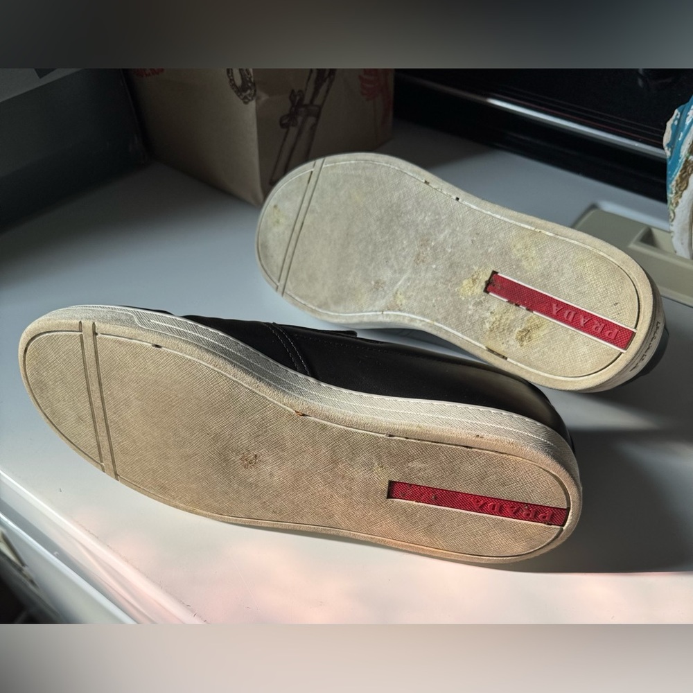 Prada Men's Black Slip-On Loafers..
Fit large I’m 10.5 - 11 and fit perfectly. - Picture 4 of 8